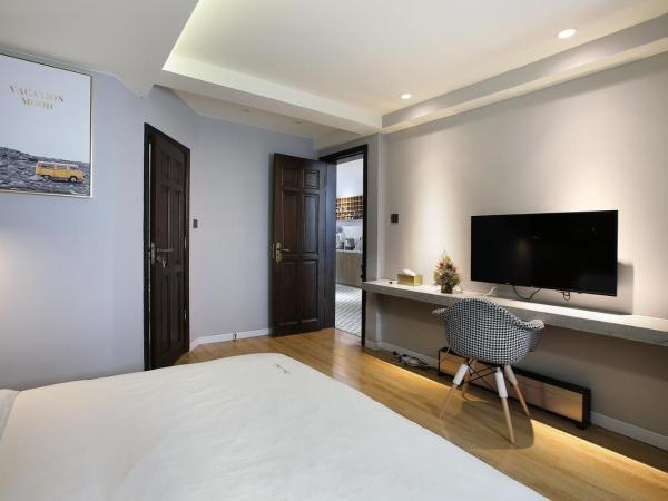 Shanghai Downtown Hills Boutique Guesthouse - Near Metro Line 7, Exit 3, Changping Road : photo 3 de la chambre ethiopia queen room with patio