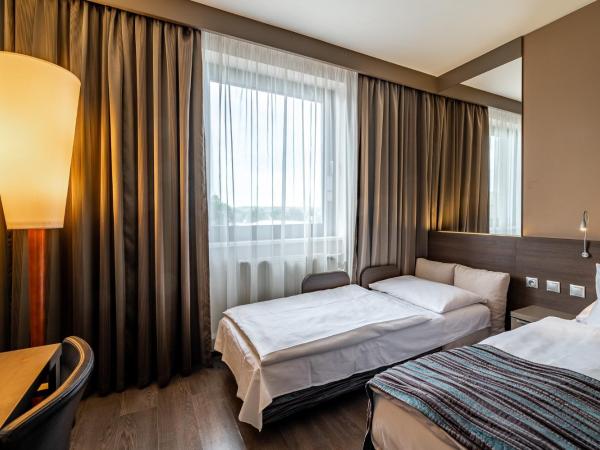 Expo Hotel : photo 3 de la chambre chambre double ou lits jumeaux standard avec lit d'appoint