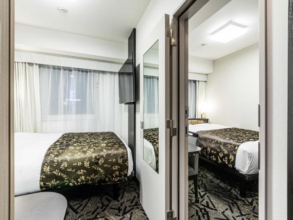 APA Hotel Nambaminami Ebisucho Eki Shinsekai : photo 2 de la chambre chambres communicantes