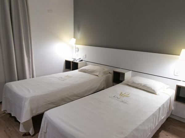 Uniclass Hotel Pinheiros : photo 6 de la chambre chambre lits jumeaux