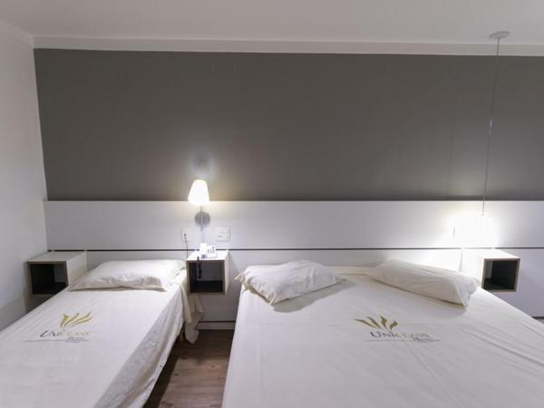 Uniclass Hotel Pinheiros : photo 2 de la chambre chambre triple