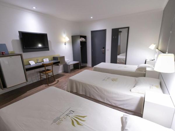 Uniclass Hotel Pinheiros : photo 1 de la chambre chambre triple