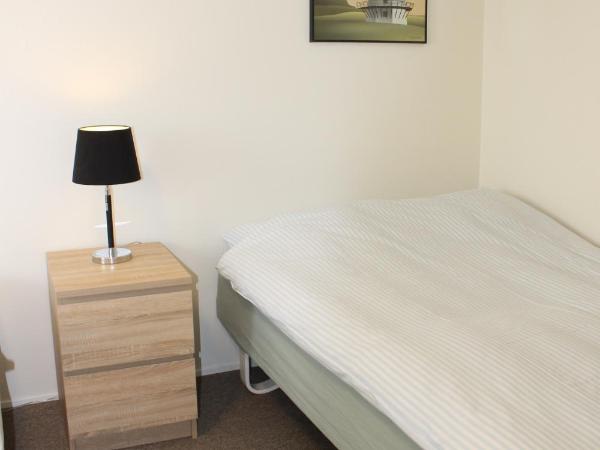 Amalie Bed and Breakfast & Apartments : photo 9 de la chambre chambre simple avec salle de bains commune