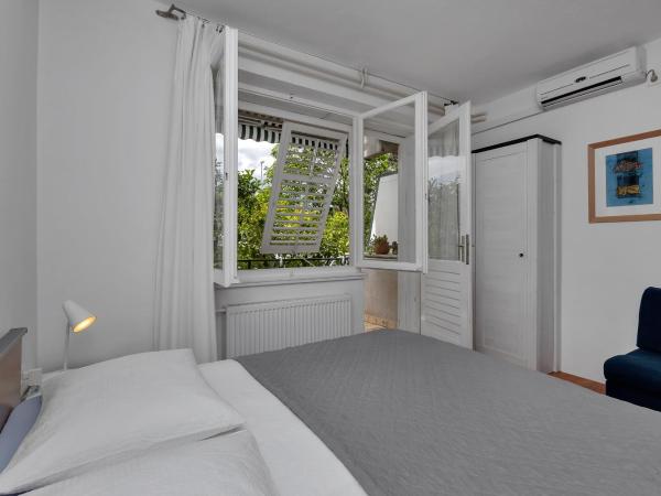 Apartments & Rooms Rica : photo 6 de la chambre studio avec vue sur jardin