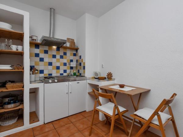 Apartments & Rooms Rica : photo 3 de la chambre studio avec vue sur jardin