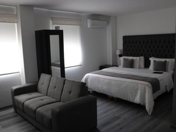 Suites Arboleda 215 : photo 9 de la chambre suite junior