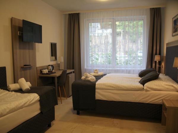 Hotel CK Park : photo 2 de la chambre chambre familiale