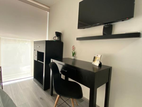 Suites Arboleda 215 : photo 2 de la chambre chambre supérieure