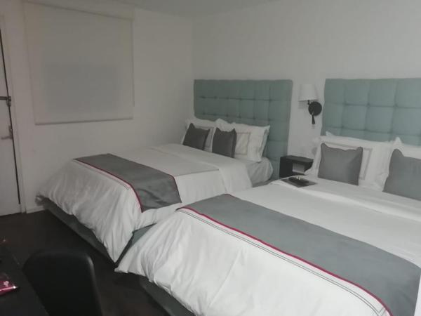 Suites Arboleda 215 : photo 5 de la chambre chambre double avec terrasse