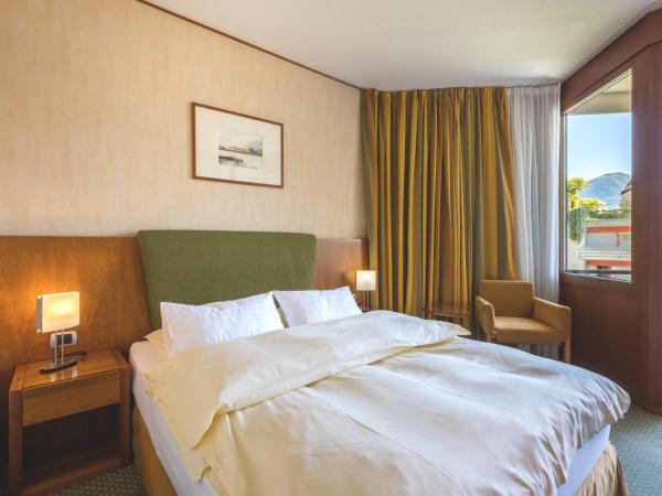 Hotel Delfino Lugano : photo 5 de la chambre chambre lit queen-size Élégante