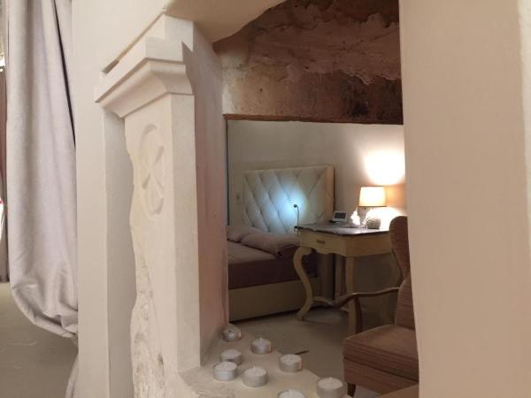 Palazzo de Carlo e il parco dei 7 pozzi : photo 7 de la chambre appartement avec terrasse