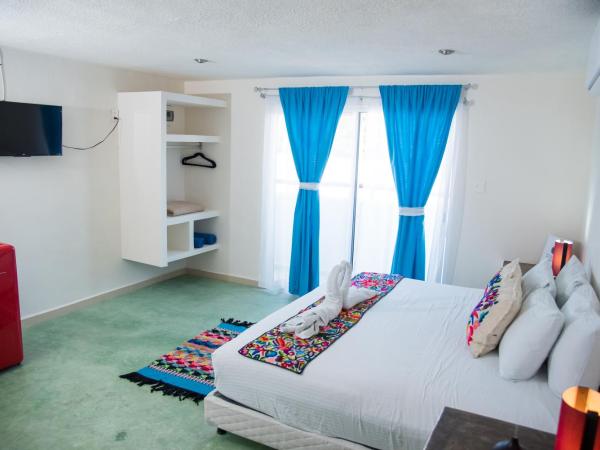 Tres Mentiras Boutique Hotel : photo 4 de la chambre chambre lit king-size avec balcon