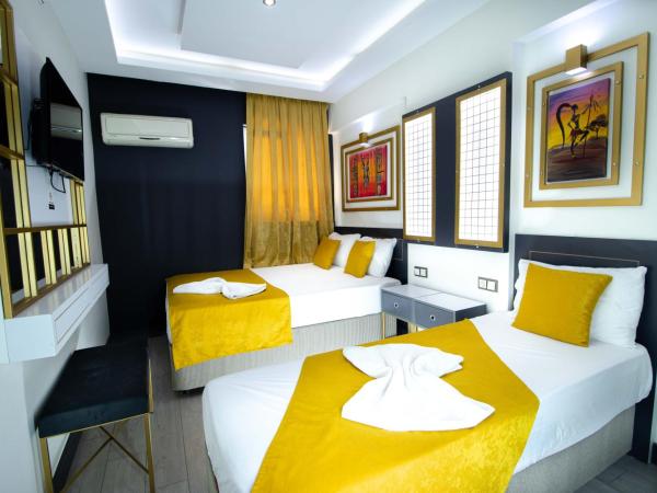 Exporoyal Hotel : photo 1 de la chambre chambre triple standard