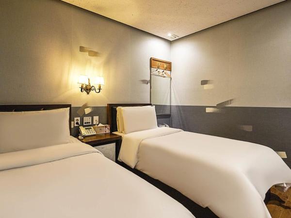 Friendly DH Naissance Hotel by Mindrum Group : photo 2 de la chambre chambre lits jumeaux Économique - petit-déjeuner inclus