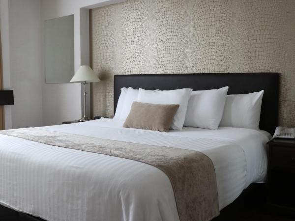Mesón Ejecutivo Guadalajara Minerva - Av México : photo 5 de la chambre chambre lit king-size supérieure