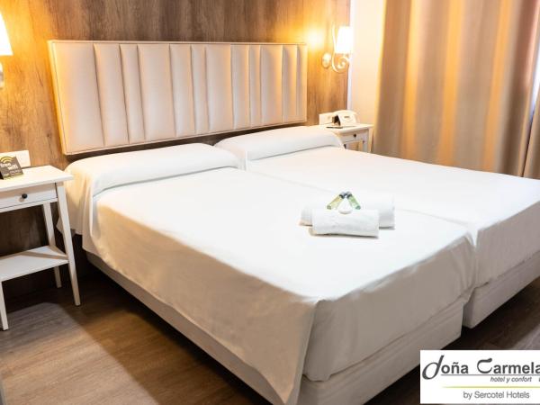 Hotel Sercotel Doña Carmela : photo 9 de la chambre chambre double 2 lits