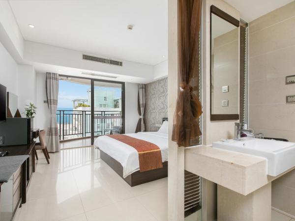 Sanya Sun and Sea Gueshouse : photo 1 de la chambre chambre lit king-size - vue sur mer