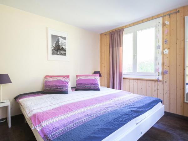 Hotel Lauberhorn - Home for Outdoor Activities : photo 2 de la chambre chambre quadruple avec balcon 