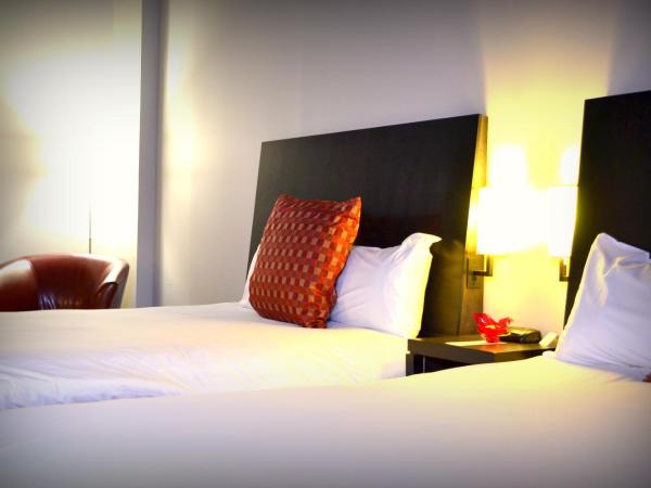 Grand Times Hotel : photo 8 de la chambre chambre grand confort lit queen-size