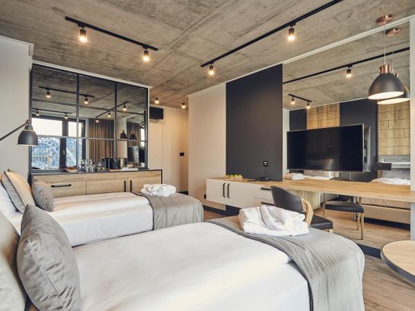 The Bridge Suites Hotel : photo 3 de la chambre chambre lits jumeaux supérieure avec vue sur la rivière