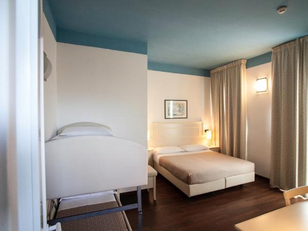 Hotel Fra I Pini : photo 7 de la chambre chambre quadruple confort