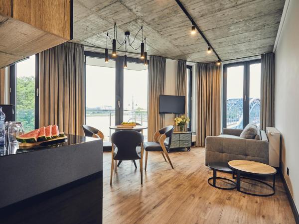 The Bridge Suites Hotel : photo 4 de la chambre corner room with river view