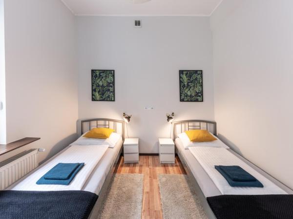 Villa Wilda : photo 1 de la chambre chambre lits jumeaux standard avec salle de bains commune