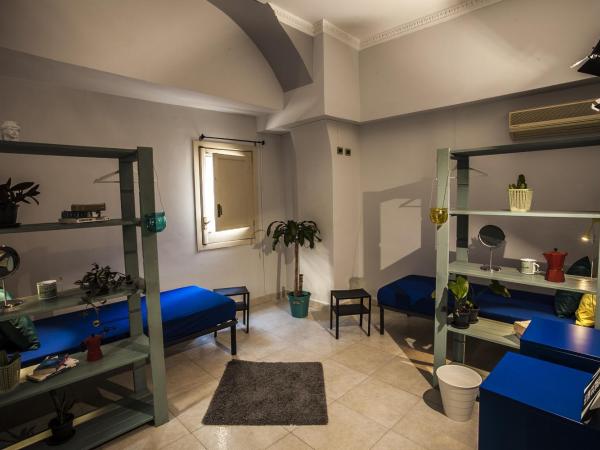 Ostello degli Elefanti : photo 7 de la chambre lit dans dortoir mixte de 4 lits avec salle de bains privée