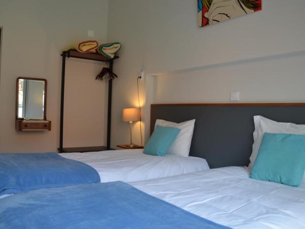 Hotel Girassol : photo 3 de la chambre chambre lits jumeaux