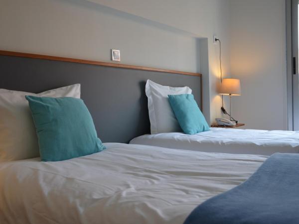 Hotel Girassol : photo 5 de la chambre chambre lits jumeaux