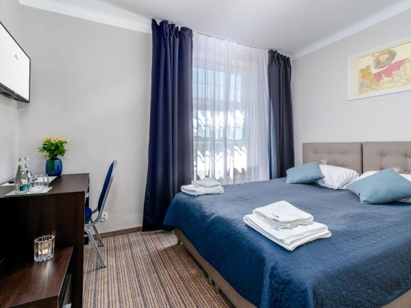 JACHTOWA Hotel i Restauracja : photo 2 de la chambre chambre double ou lits jumeaux deluxe - vue sur rivière