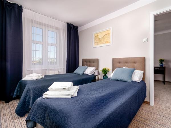 JACHTOWA Hotel i Restauracja : photo 1 de la chambre studio familial