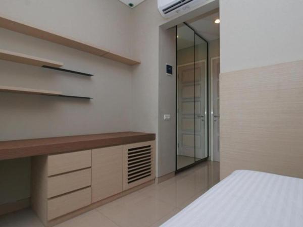 Home 899 Patal Senayan : photo 4 de la chambre chambre lits jumeaux standard