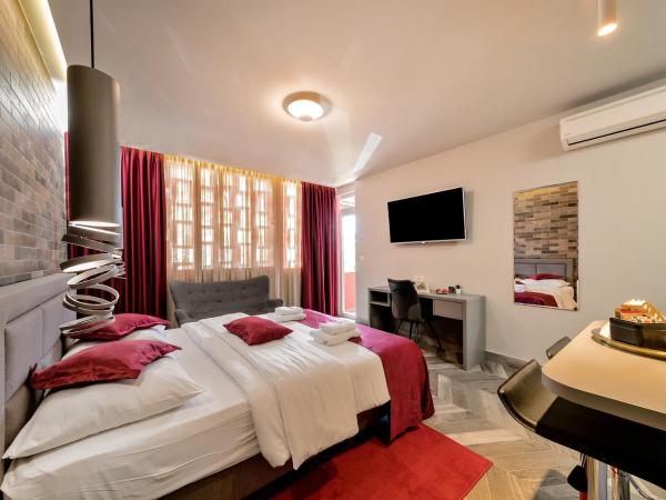 Il Giardino Luxury Rooms & Suites : photo 9 de la chambre suite deluxe