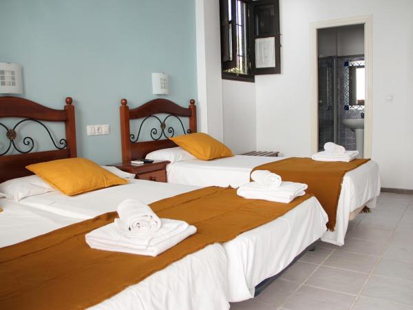 La Piquera Hostal : photo 1 de la chambre chambre triple