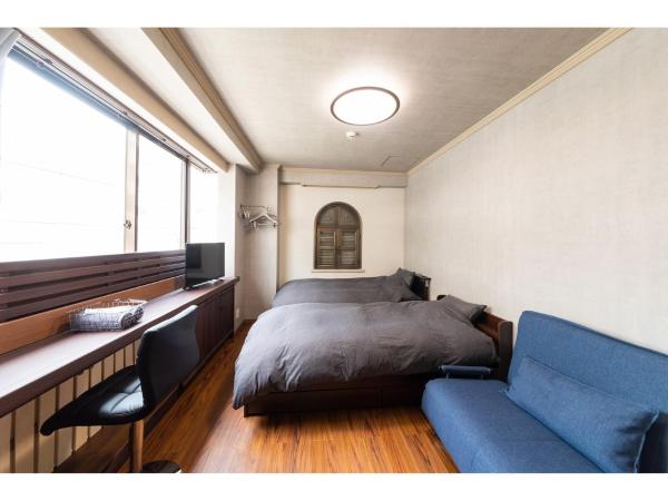 Oyado Kien Ryogoku : photo 2 de la chambre chambre triple avec salle de bains commune