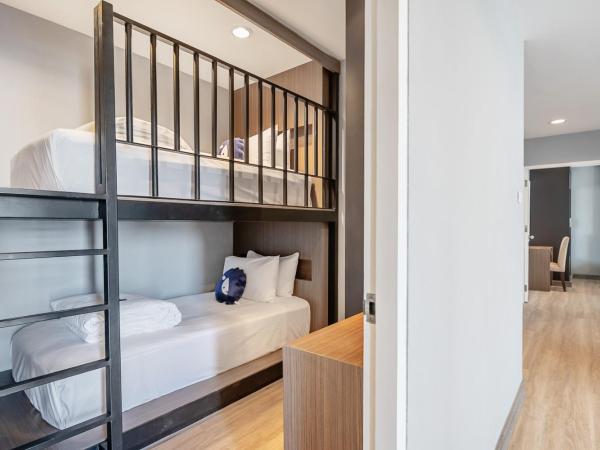 Kokotel Bangkok Dheva Thonglor : photo 2 de la chambre chambre quadruple deluxe