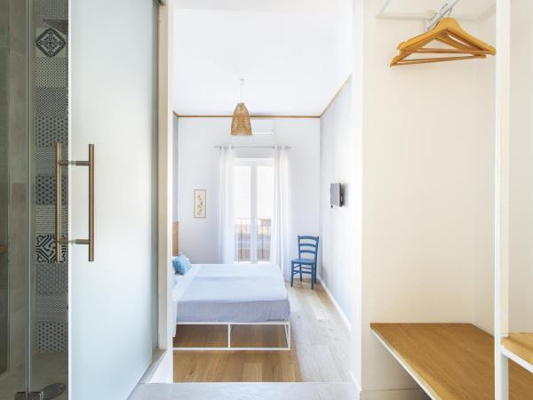 Canceddi Rooms : photo 1 de la chambre chambre double avec salle de bains privative