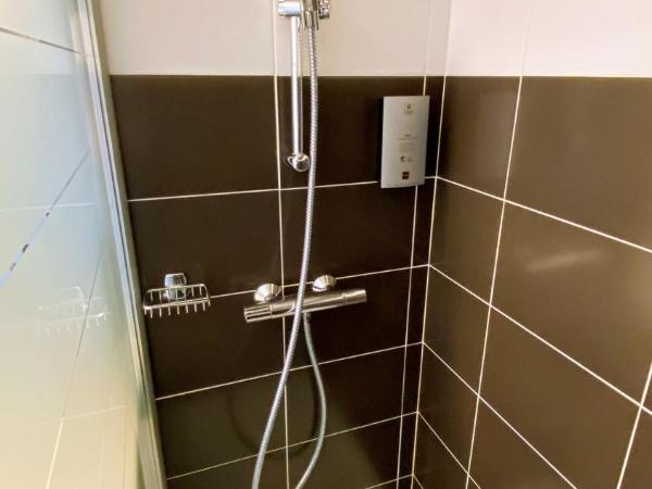 Logis - Le Christina : photo 6 de la chambre chambre lits jumeaux confort