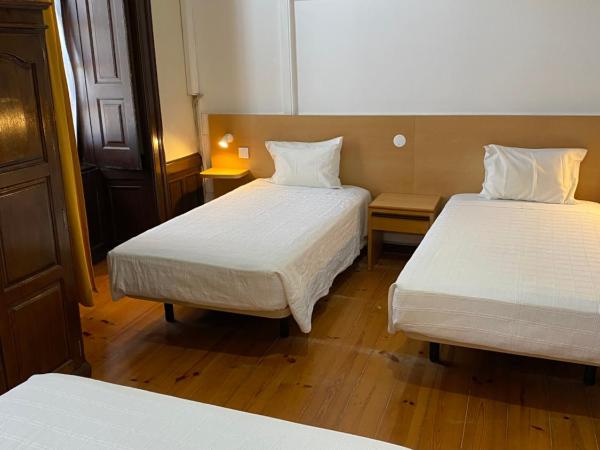 Guesthouse Lusa Atenas : photo 2 de la chambre chambre quadruple