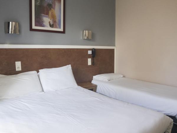 Citotel Hôtel Cesar : photo 4 de la chambre chambre triple familiale