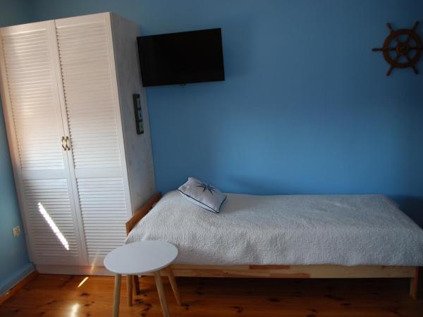 HydroZagadka Kołobrzeg : photo 4 de la chambre chambre triple - vue sur jardin