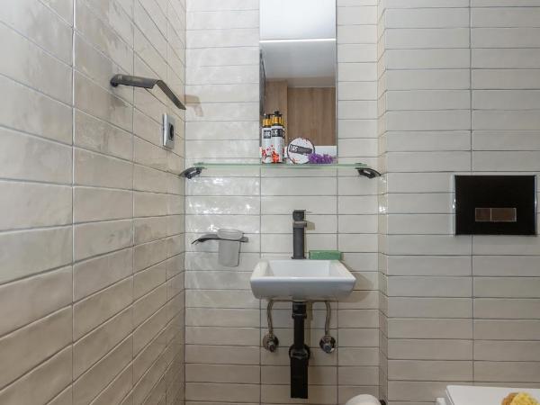 LOC HOSPITALITY Urban Den : photo 9 de la chambre petite chambre lits jumeaux