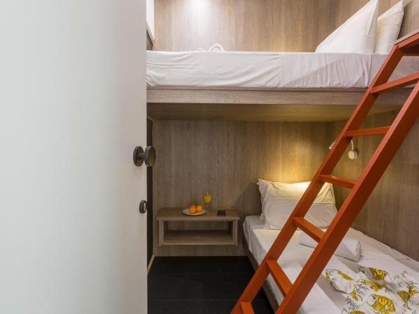 LOC HOSPITALITY Urban Den : photo 6 de la chambre petite chambre lits jumeaux