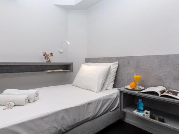 LOC HOSPITALITY Urban Den : photo 2 de la chambre chambre simple