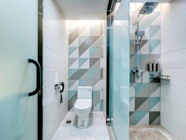 Happy Dragon City Culture Hotel-Tianjin Draum Tower & Dayuecheng shopping mall : photo 7 de la chambre chambre lits jumeaux deluxe