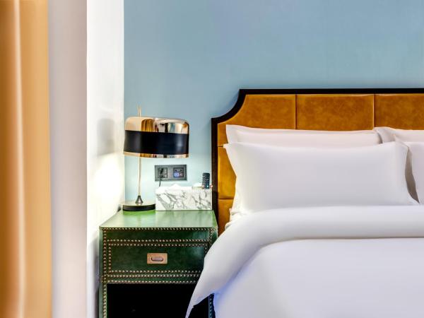 Happy Dragon City Culture Hotel-Tianjin Draum Tower & Dayuecheng shopping mall : photo 3 de la chambre chambre double avec salle de bains privative