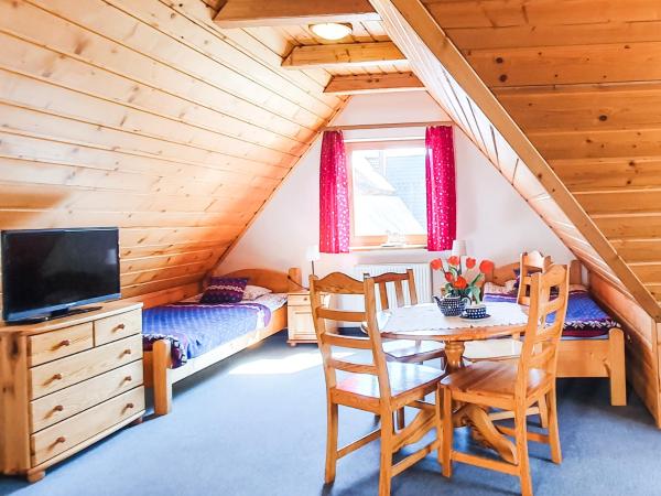 Zakopane Stop : photo 3 de la chambre chambre quadruple