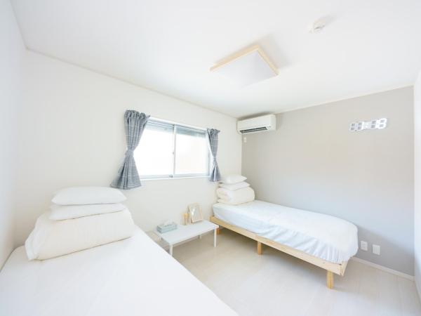 Osaka Yeon House : photo 10 de la chambre chambre lits jumeaux standard avec salle de bains commune
