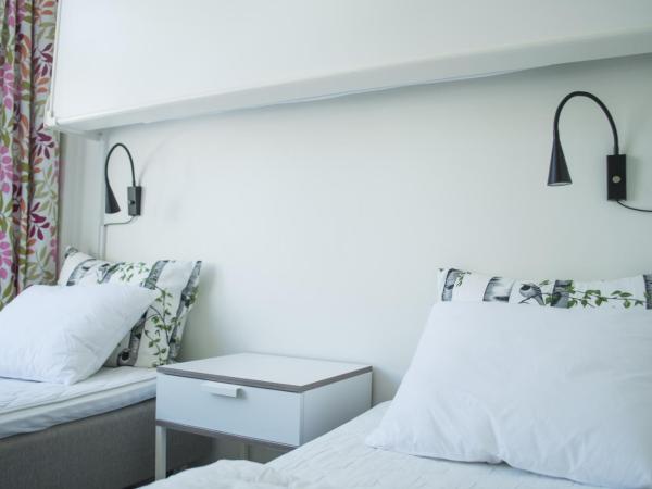 Slottsskogens Hostel : photo 3 de la chambre chambre quadruple avec salle de bains privative